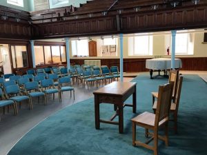 Lightweight wooden stacking upholstered chairs for Taunton united reformed church