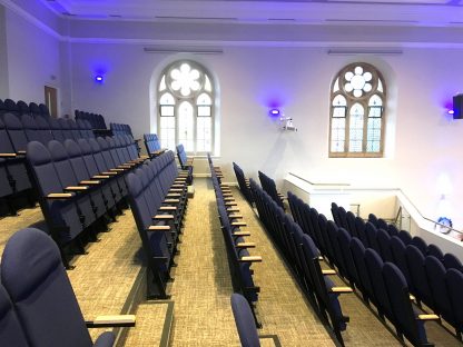 Tip-up auditorium church seating - tiered seating at Holy Trinity Church in Leicester