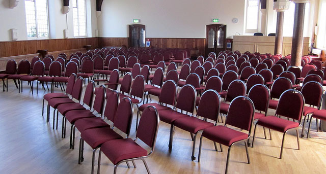 Lightweight stacking aluminium chairs with upholstered seats and back rests from Alpha Furnishing